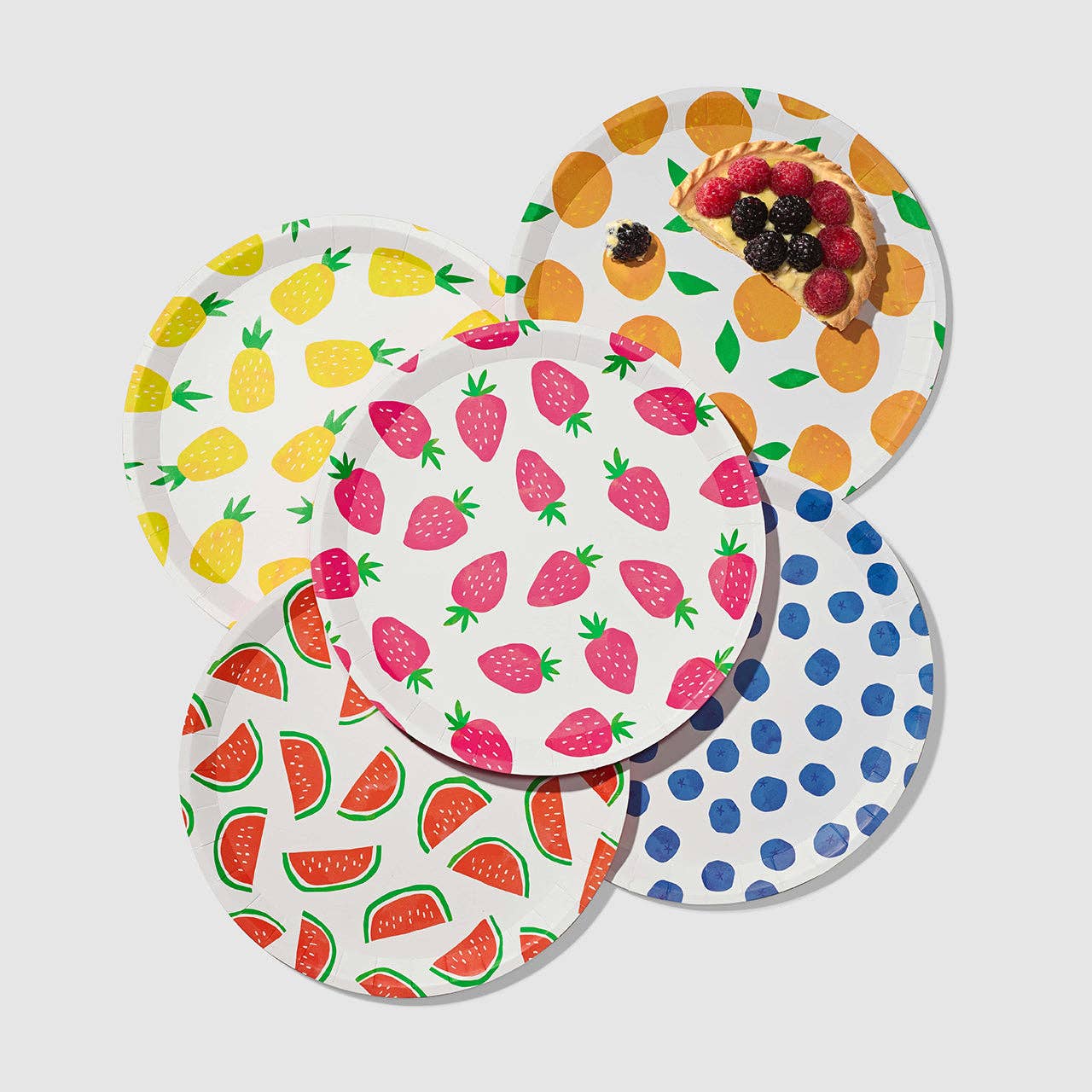 Paper party plates featuring strawberries, blueberries, pineapples, watermelon and oranges