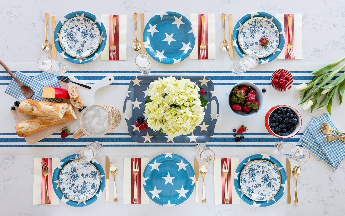 Packshot of a blue reusable bamboo serving tray with white star print