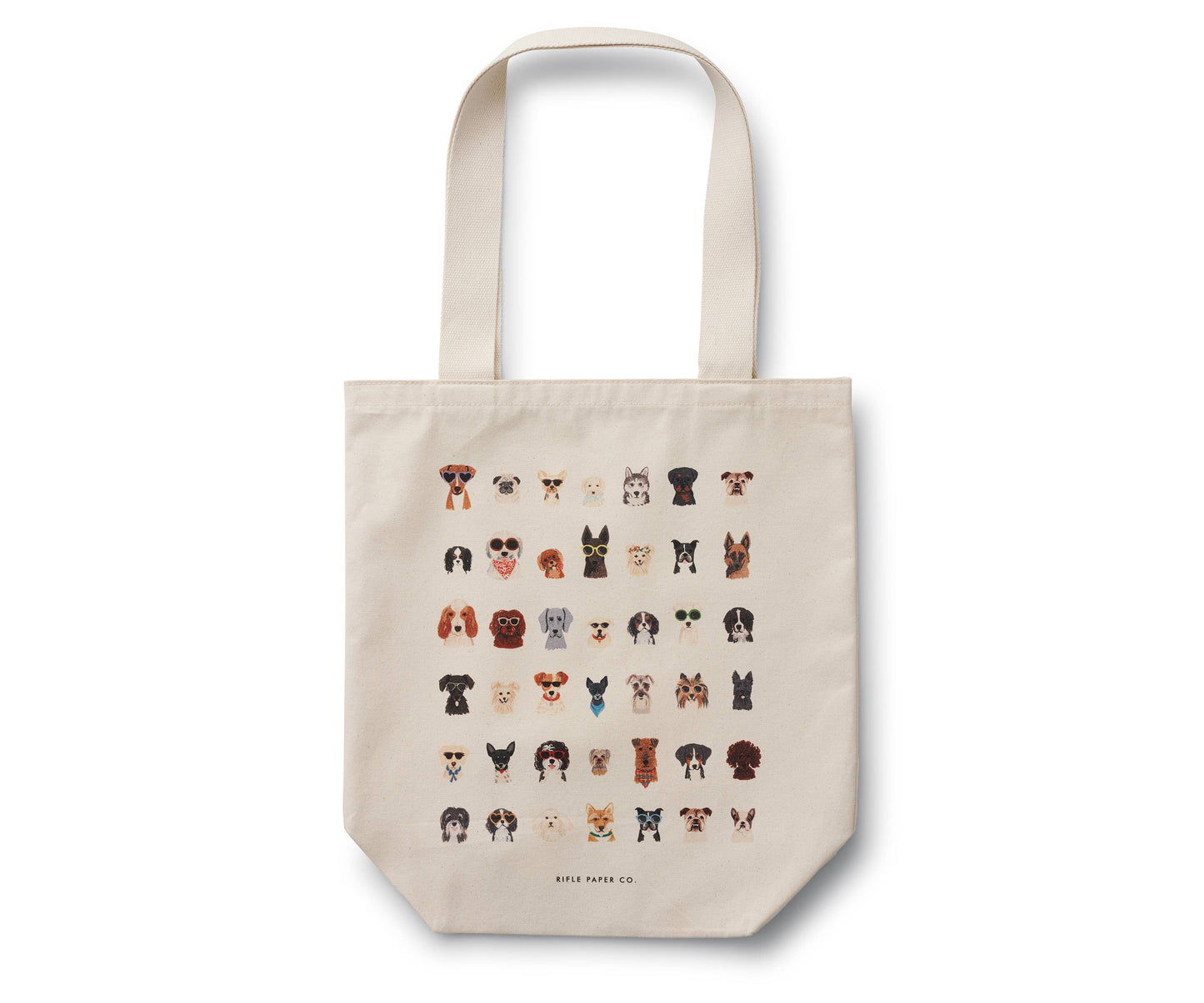 Beige tote bag with dog illustrations on a white background
