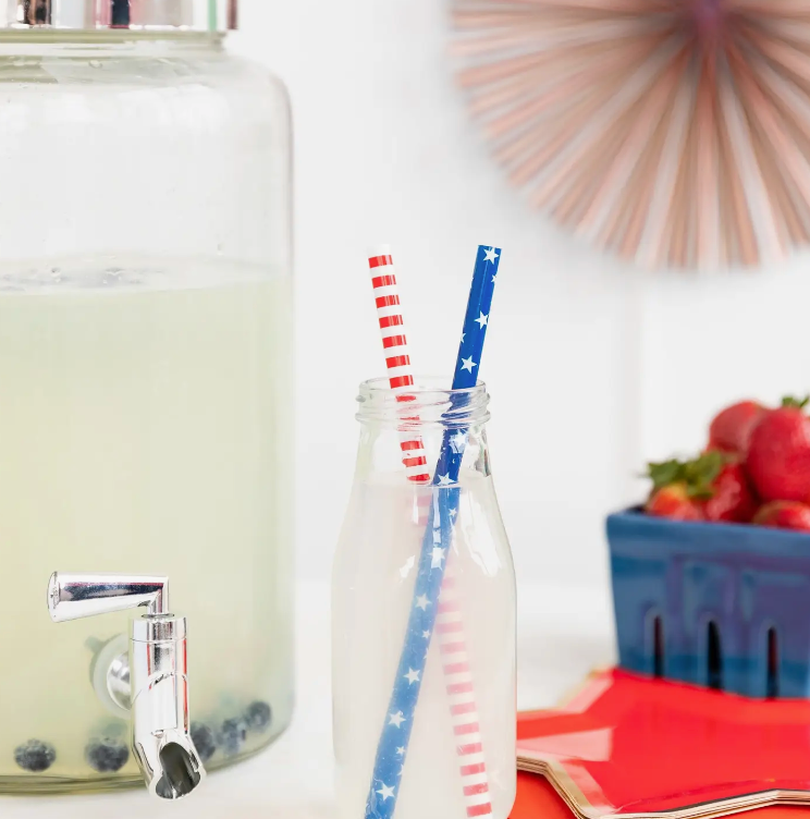 Red, white and blue straws in a mason jar