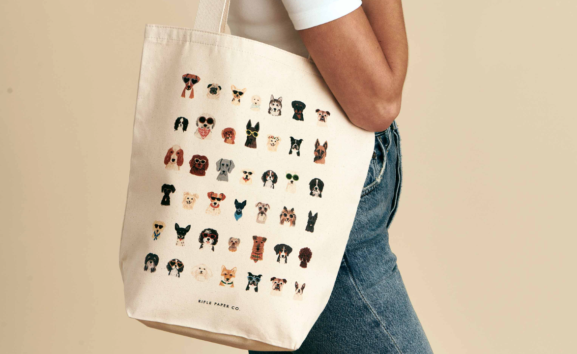Image of someone wearing a dog tote bag on their shoulder
