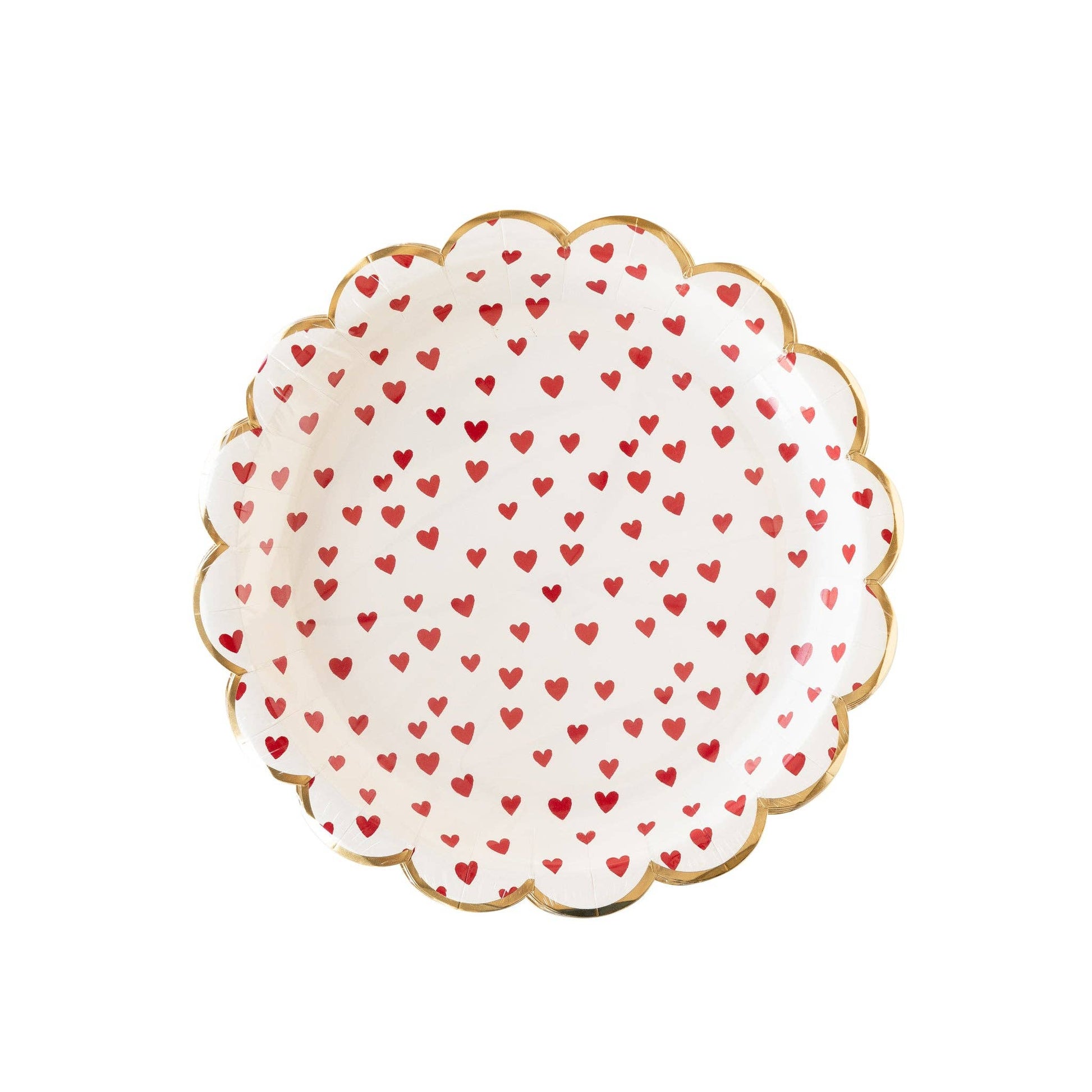 Decorative round scalloped plate with red heart pattern