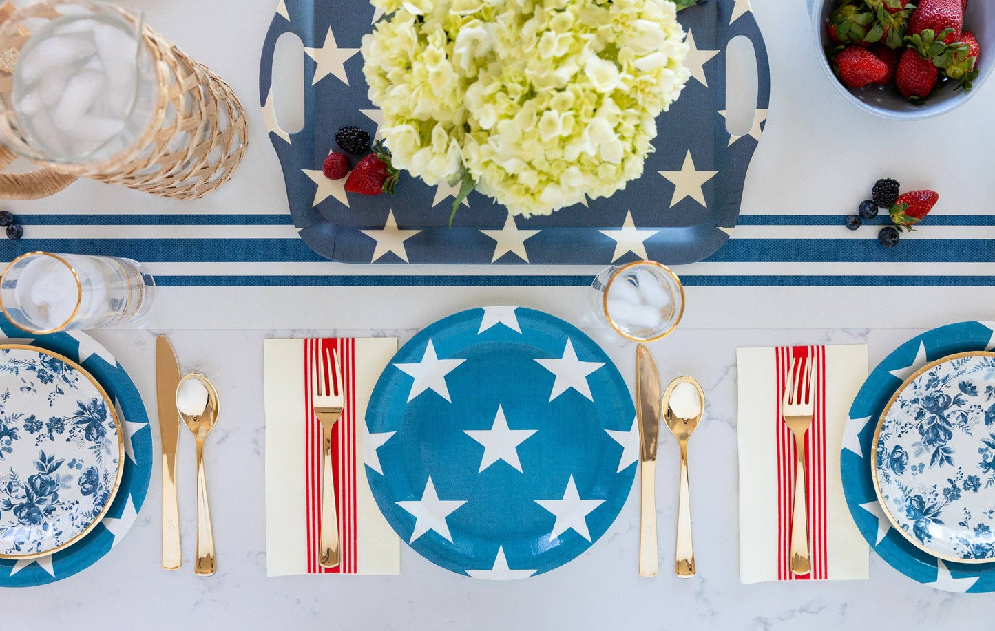 Packshot of a blue reusable bamboo serving tray with white star print