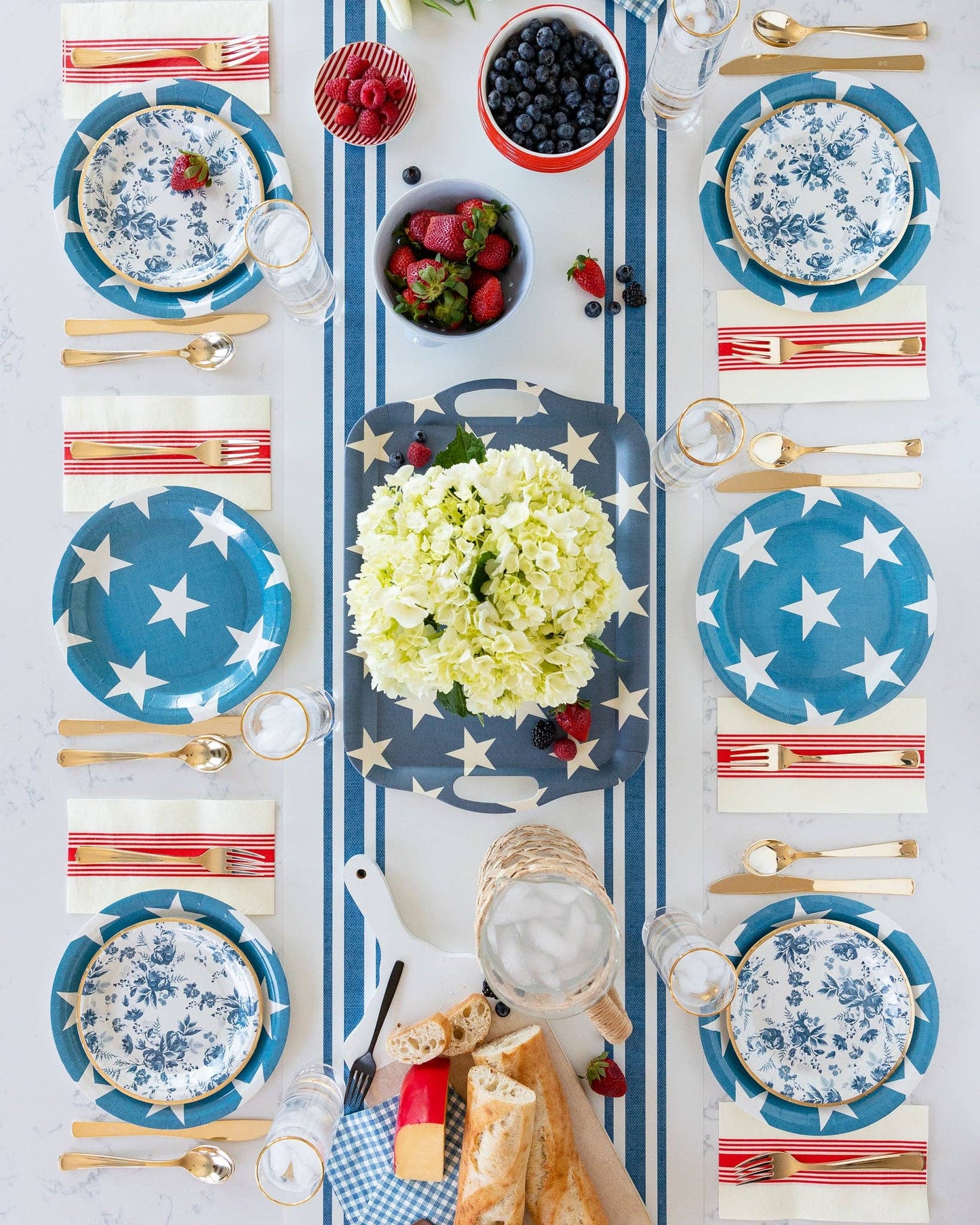 Packshot of a blue reusable bamboo serving tray with white star print