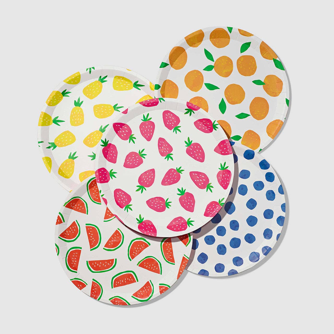 Paper party plates featuring strawberries, blueberries, pineapples, watermelon and oranges