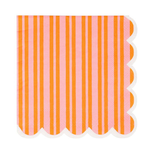 Pink and orange striped napkin with scallop-edged on 2 sides on a white background