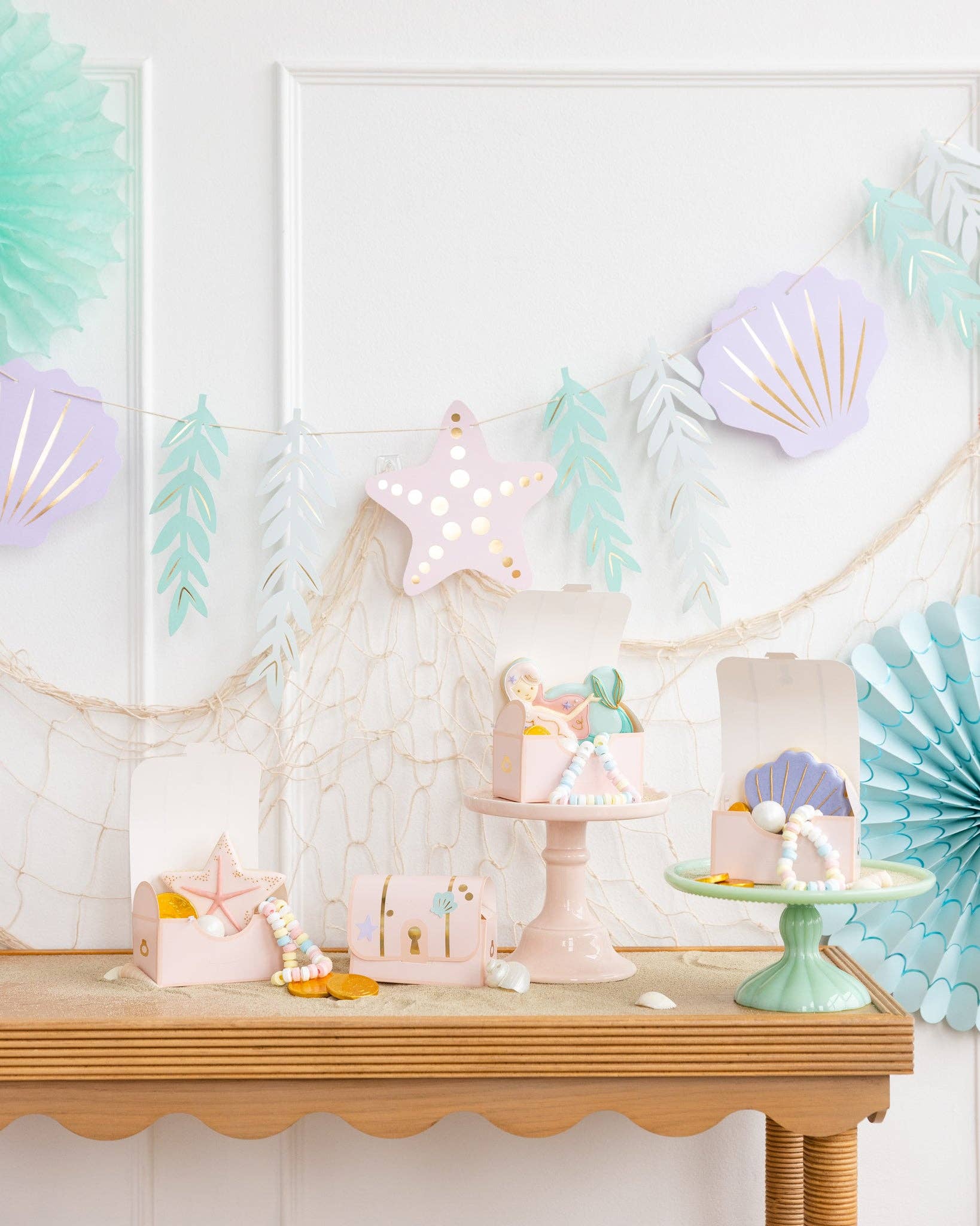 mermaid-themed party banner featuring seashells, starfish and seaweed