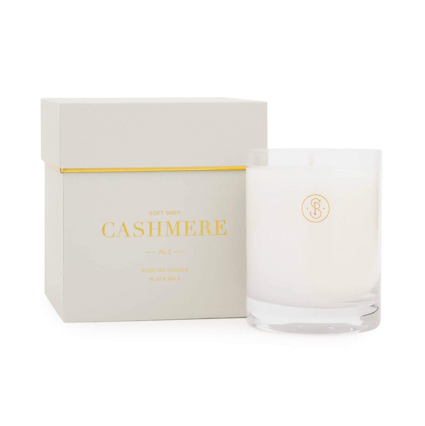 Cashmere-scented candle with packaging on a white background
