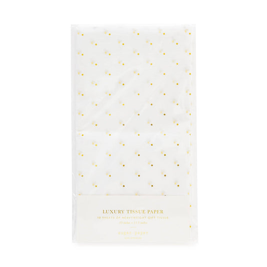 White tissue paper with gold polka dots