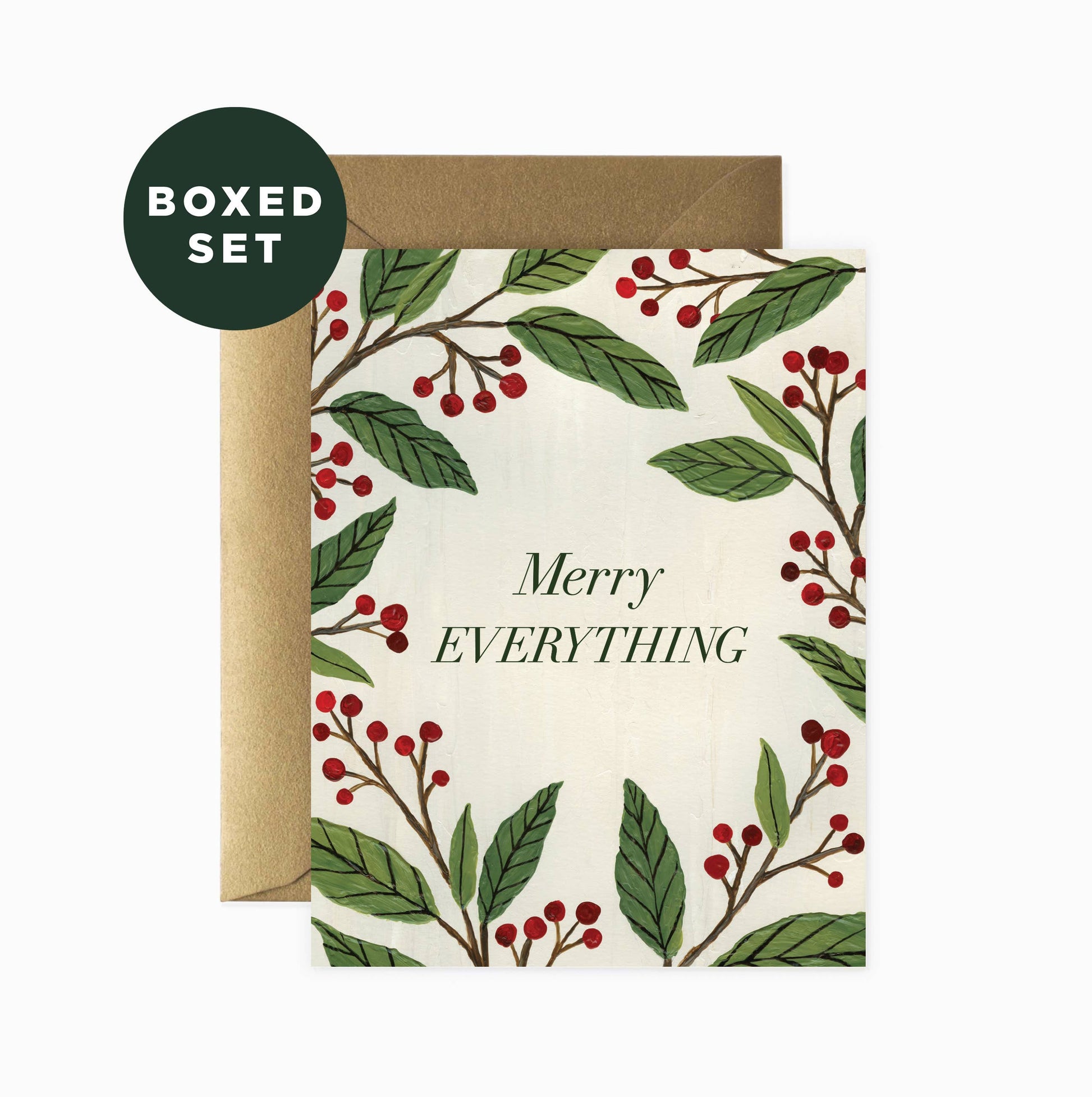 Front image of a single Merry Christmas boxed card set decorated with holly berries featuring a gold envelope.