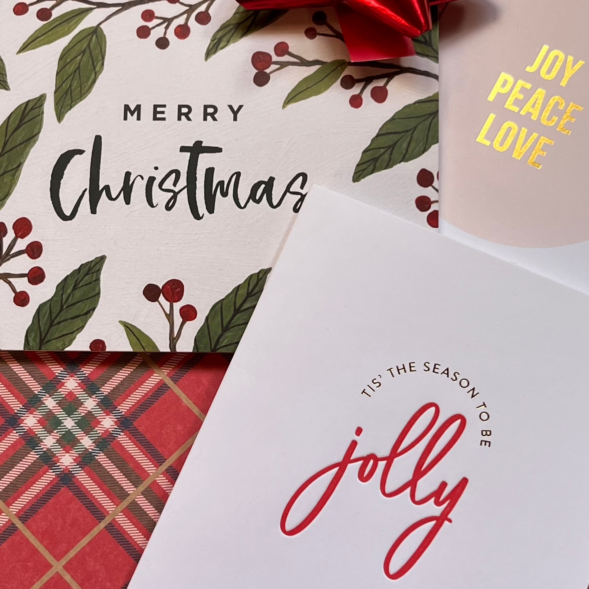 Image of 3 Christmas greeting cards on a plaid background