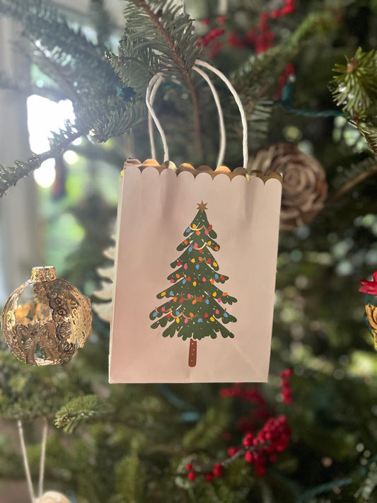 Image of a of Christmas tree gift bags on a tree