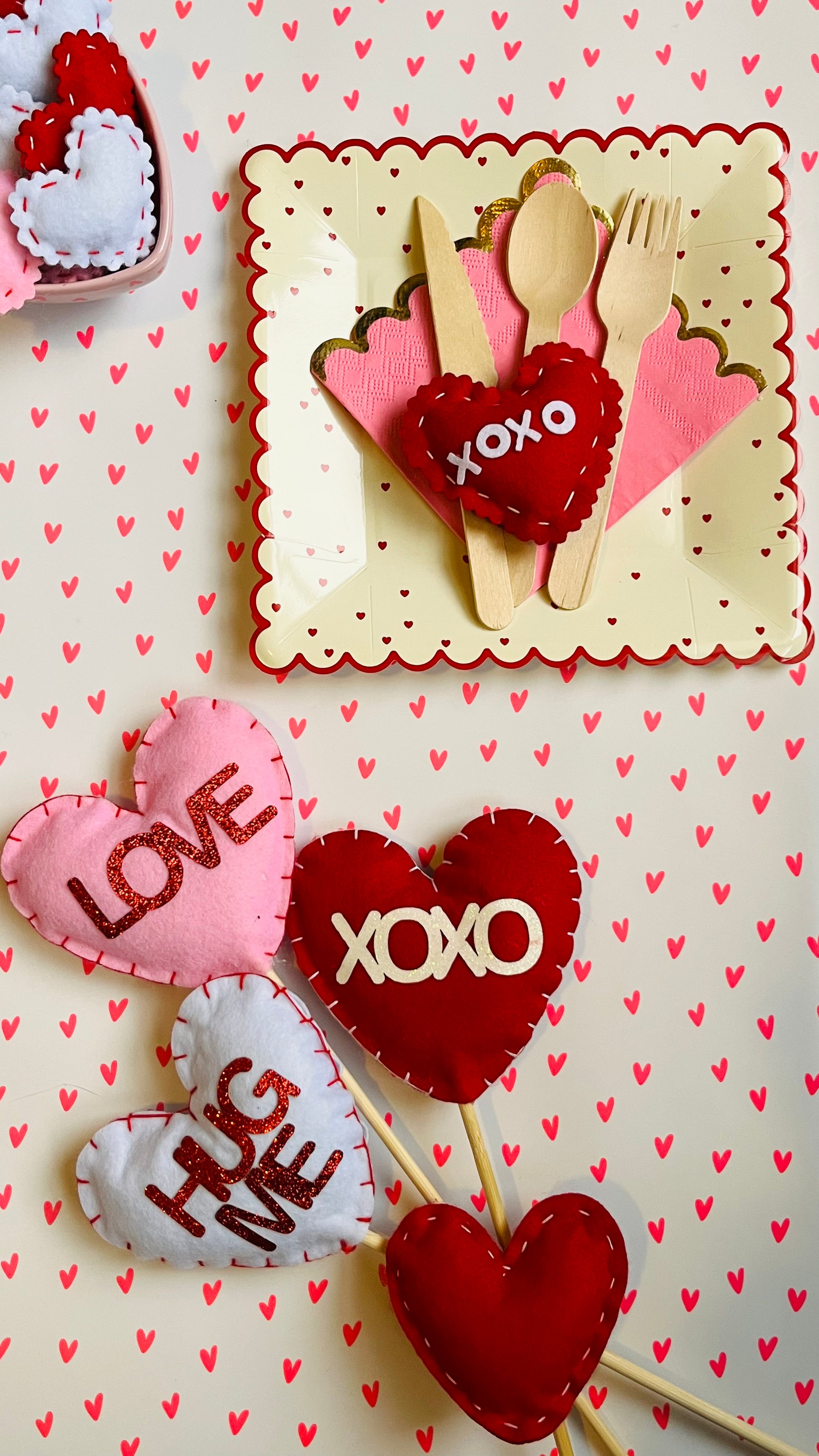 Valentine's Day table setting featuring felt heart picks and felt scatter in assorted colors