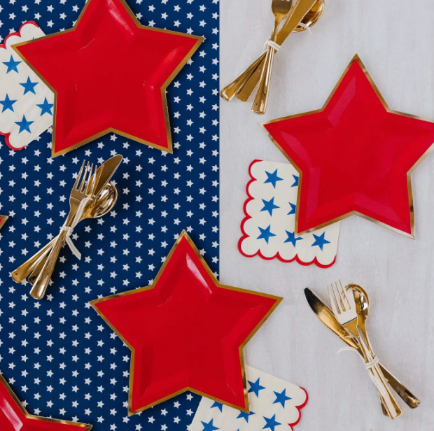 5" paper napkins with a red scalloped edge and blue star print