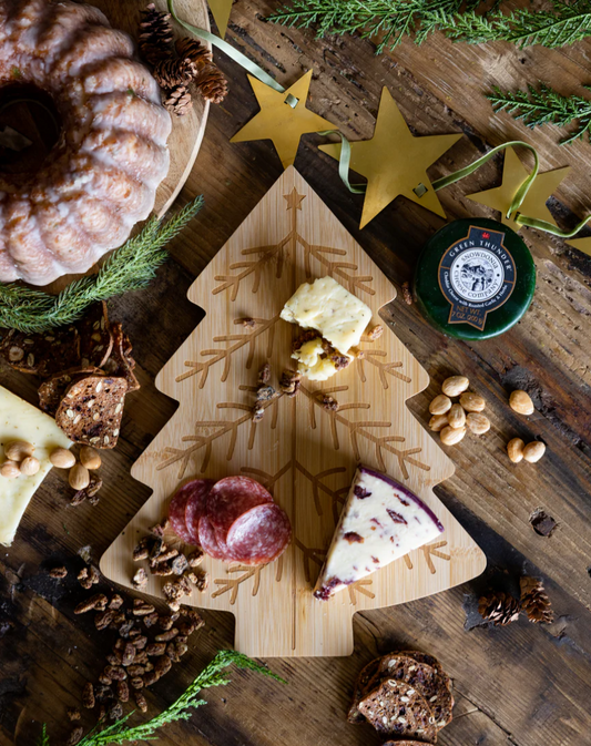 Lifestyle image of a tree-shaped bamboo cutting board