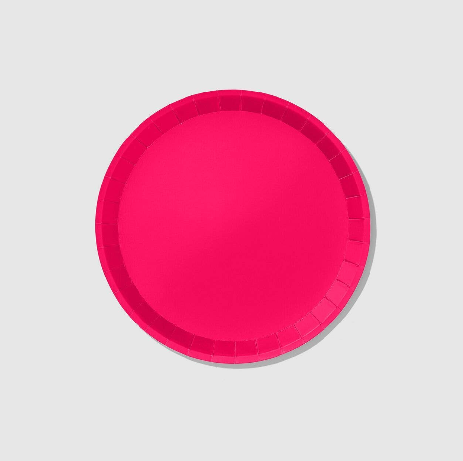 Pink paper plate on a light gray background