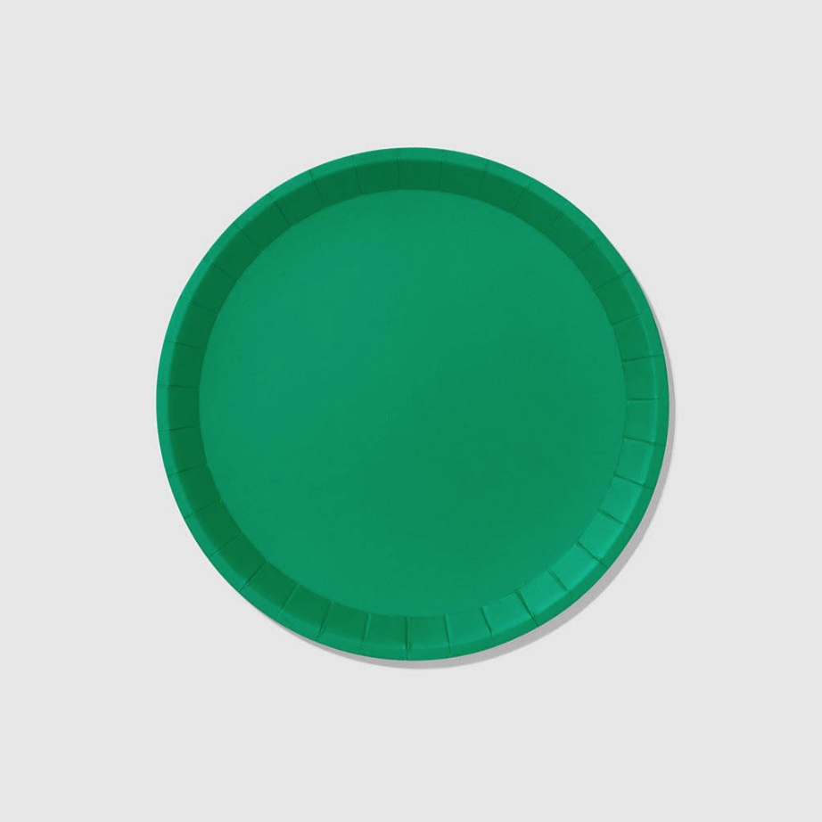Green paper plate on a light gray background