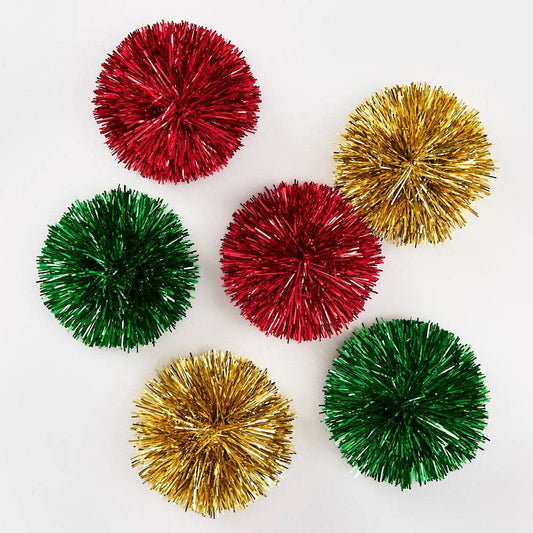 Set of colorful metallic tinsel bows on a white background