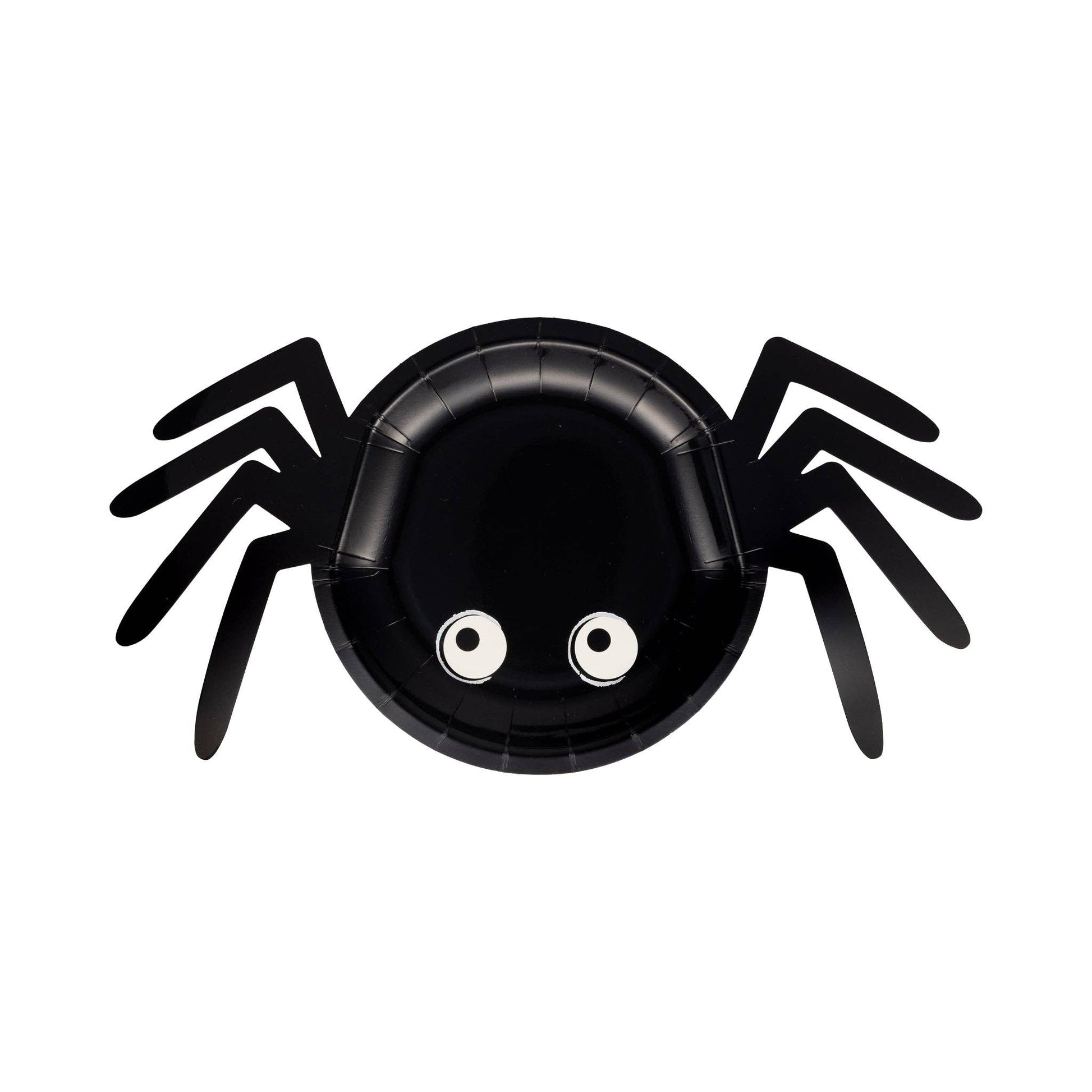 Black spider-shaped plate with googly eyes on a white background