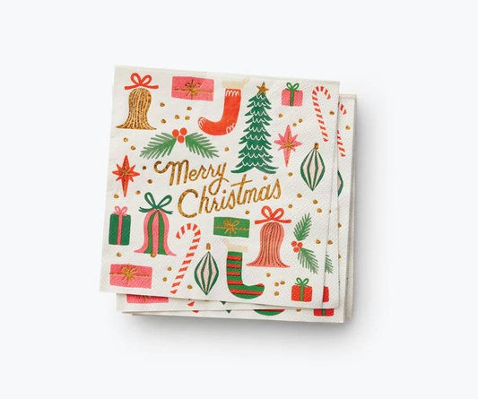 Stack of Christmas napkins with colorful designs on a white background
