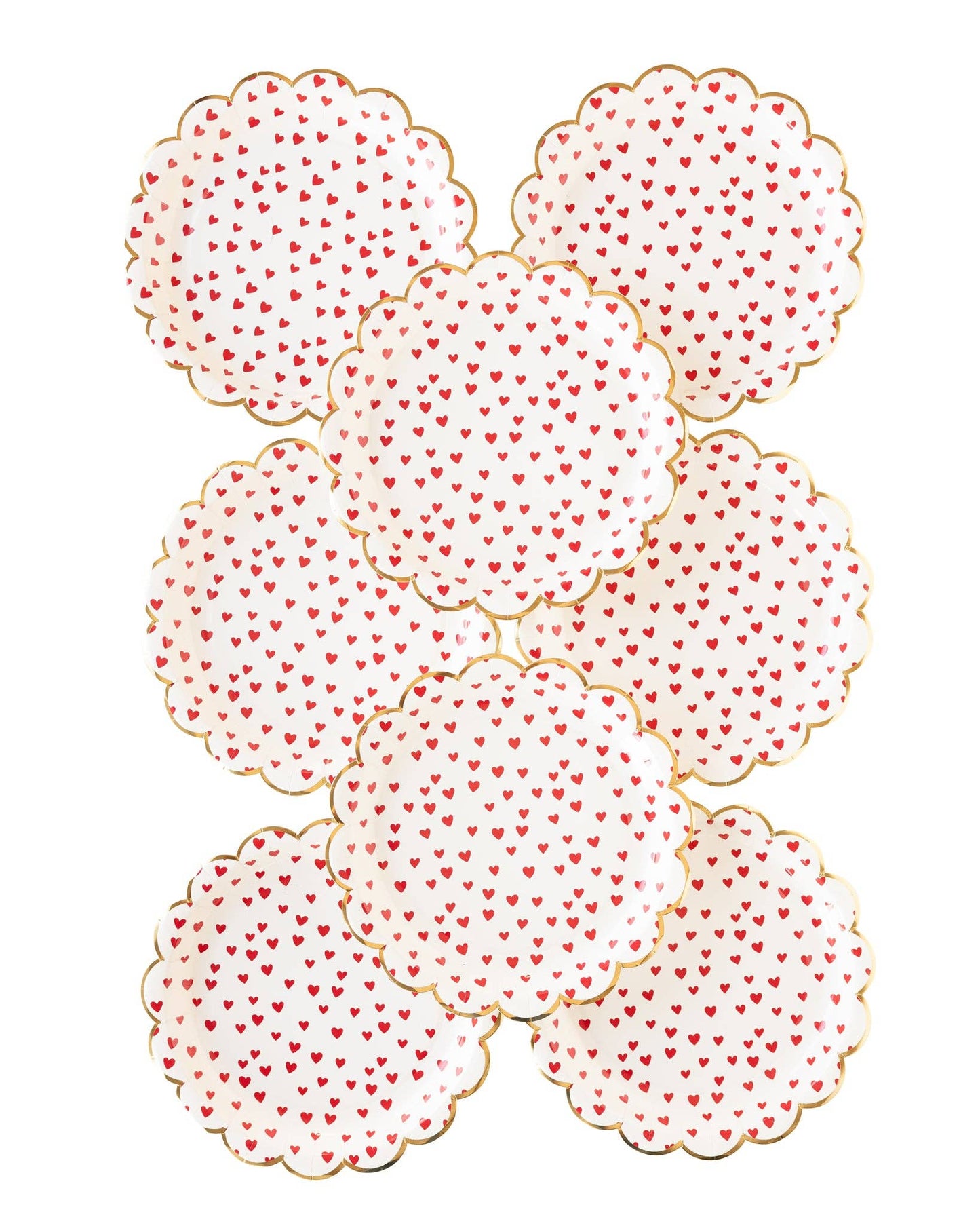 Decorative round scalloped plate with red heart pattern