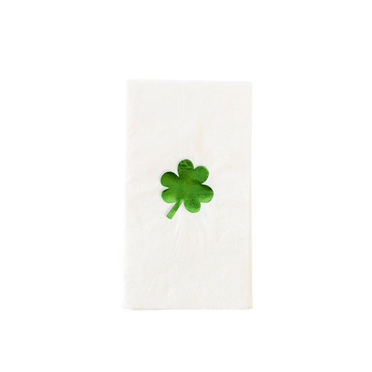 Packshot of a white dinner napkin with a green foil shamrock