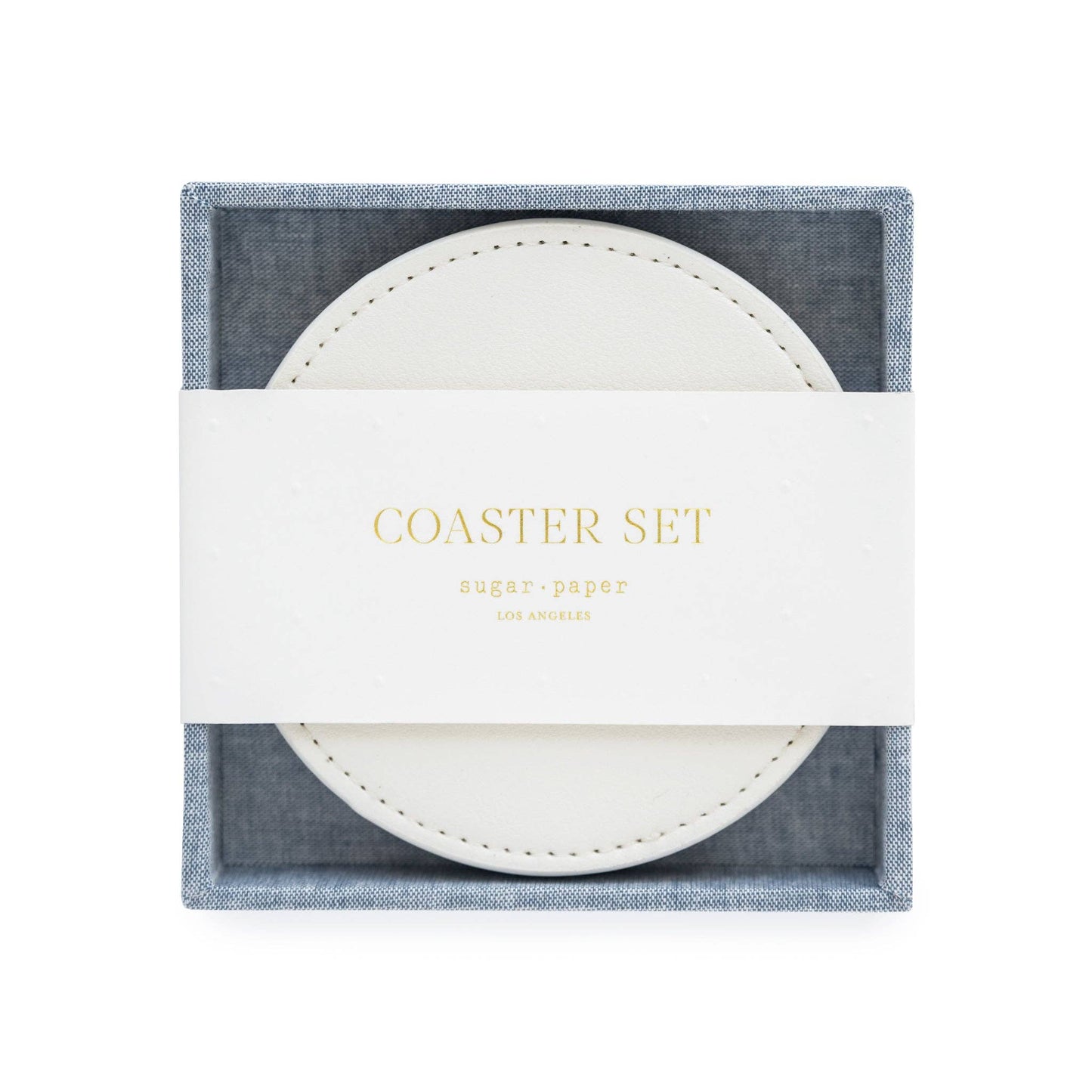 Set of white coasters in a chambray box with 'Coaster Set' text.