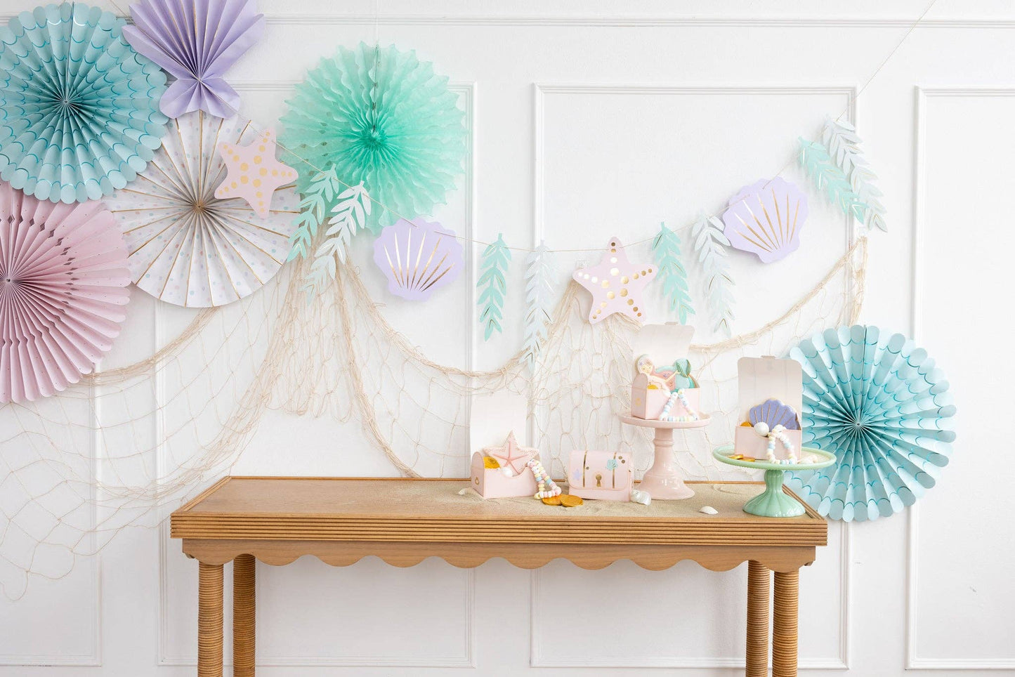 mermaid-themed party banner featuring seashells, starfish and seaweed