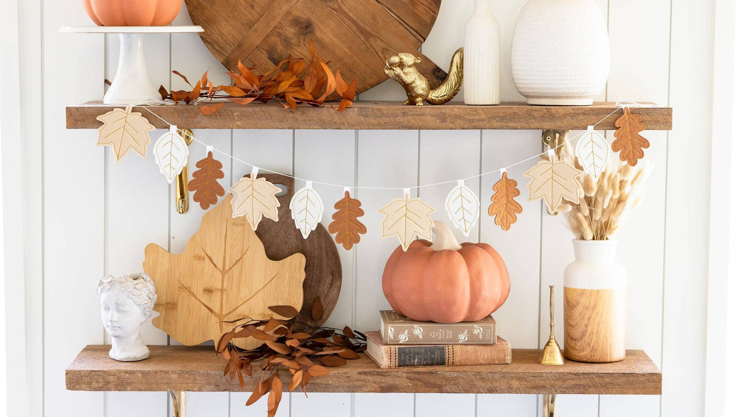 felt banner containing fall leaves