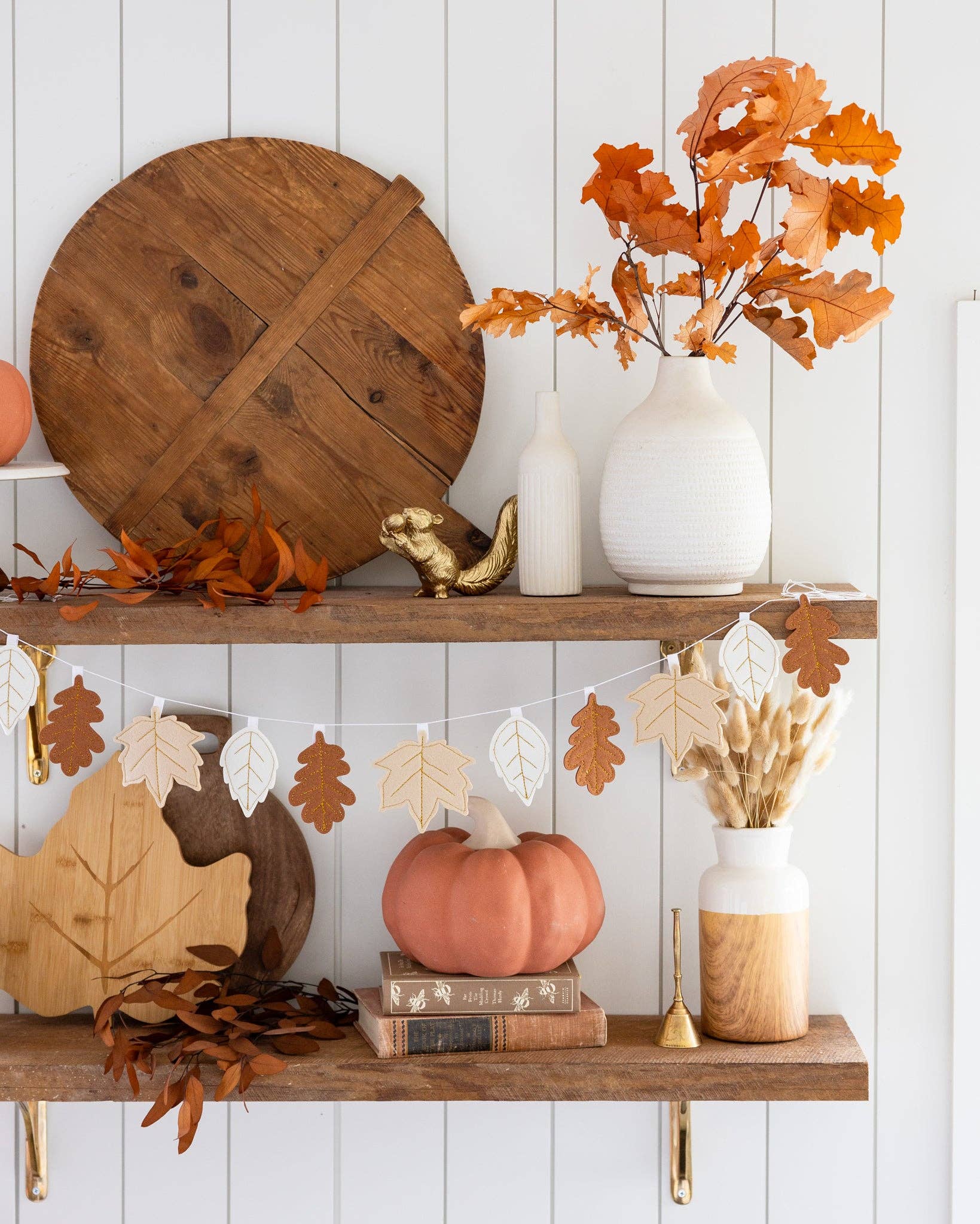 felt banner containing fall leaves