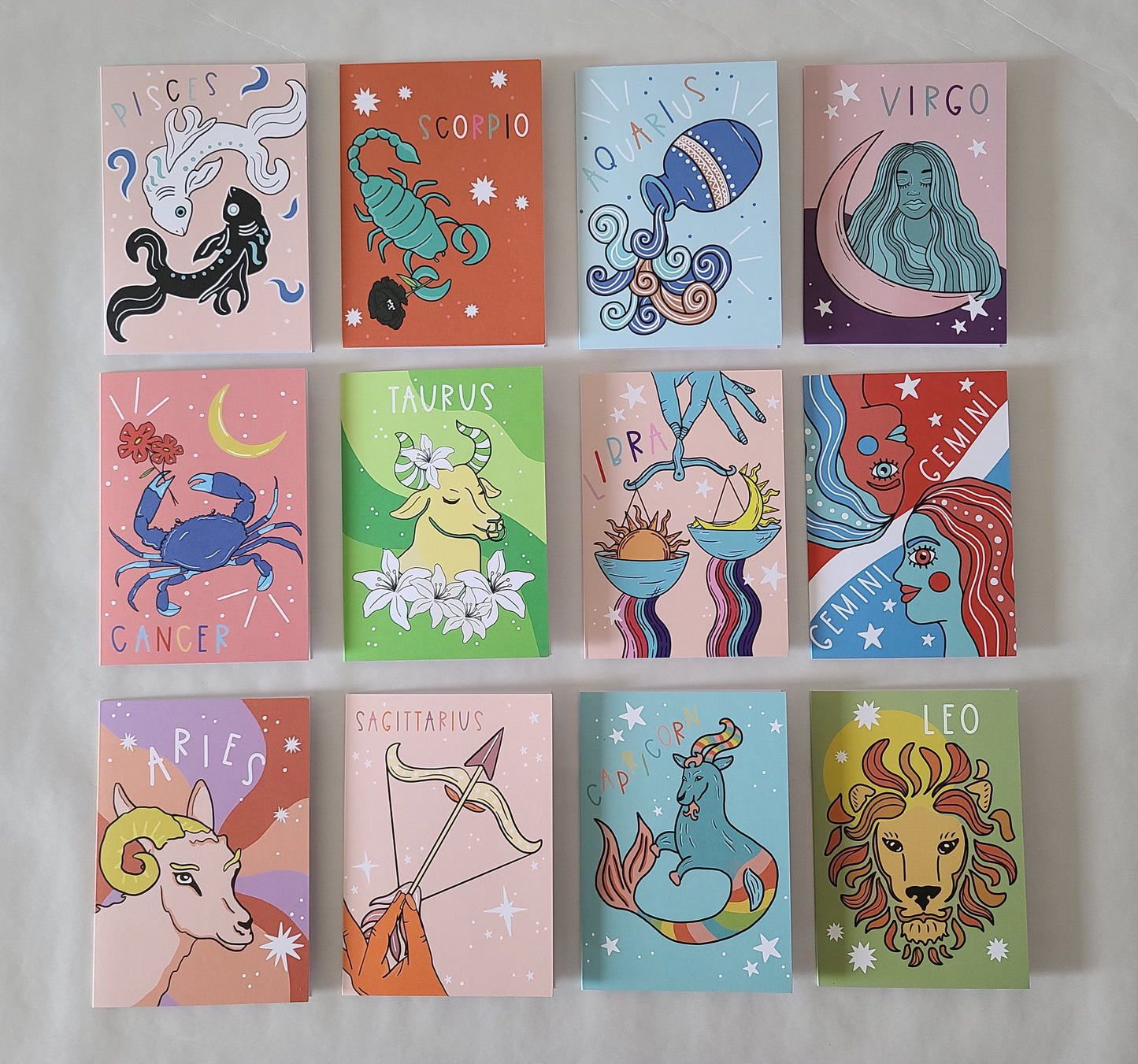 Assortment of twelve zodiac birthday cards