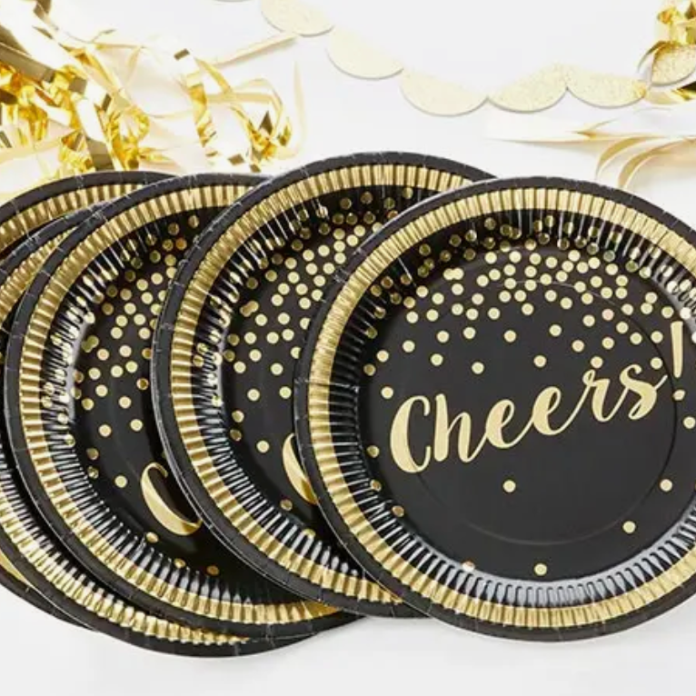 Kate Aspen black paper plates with gold foil accents and the word "Cheers!" across the plate