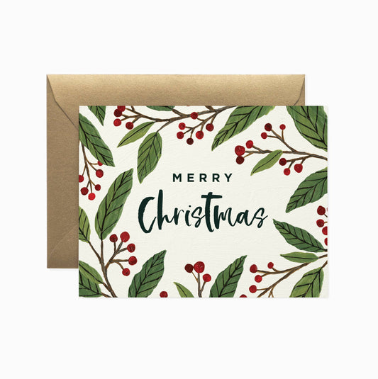 Front image of a Merry Christmas card decorated with holly berries featuring a gold envelope